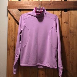 Ladies Nike DRI-FIT long sleeve workout shirt.